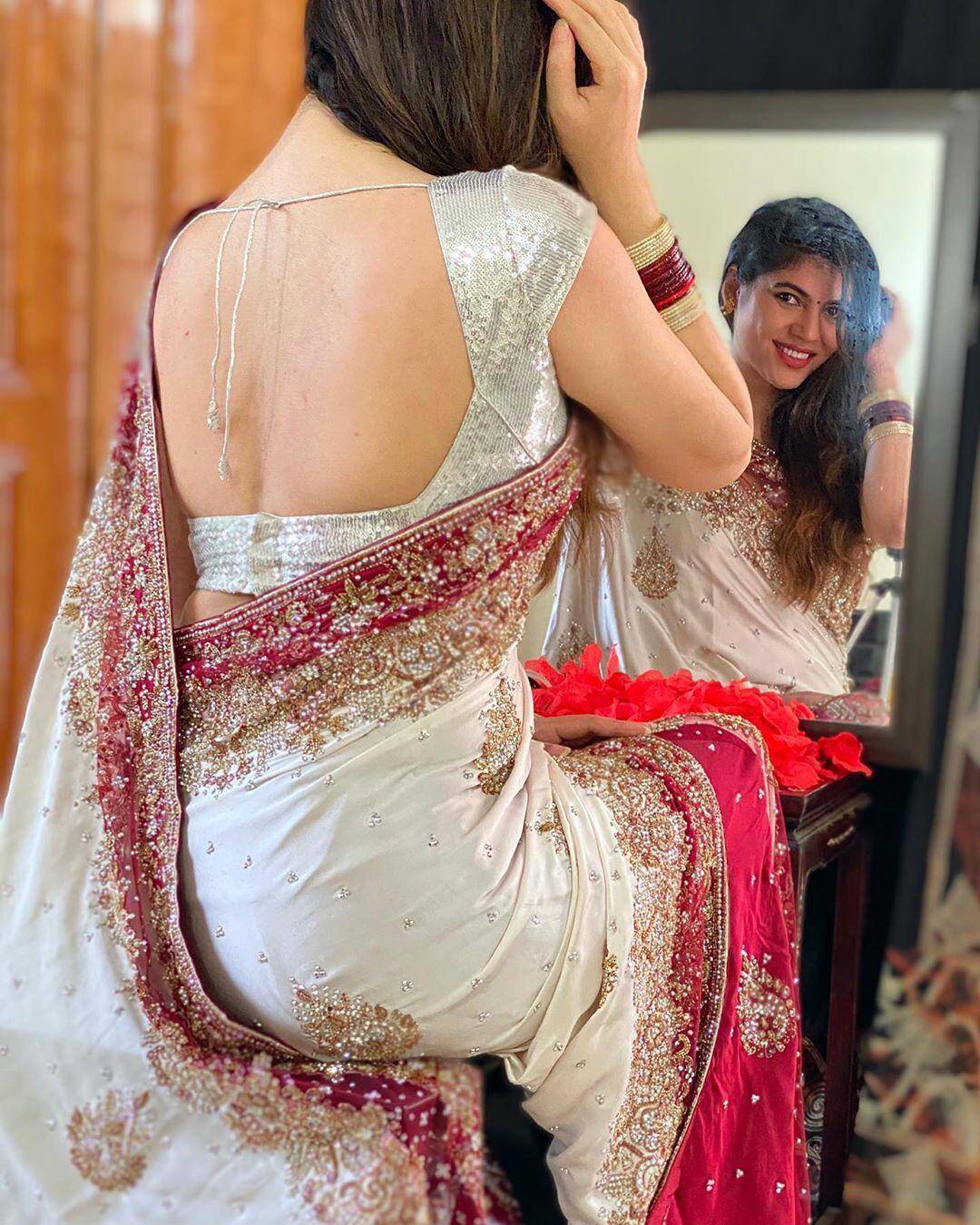 Actress Sherin looks angelic in an embellished white saree