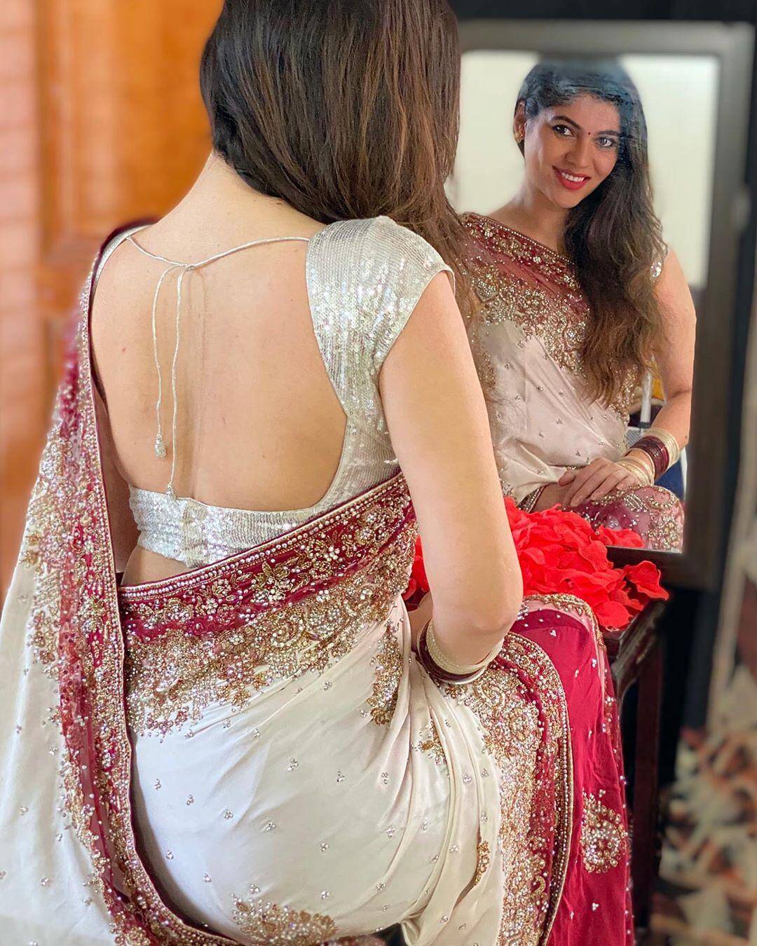 Actress Sherin looks angelic in an embellished white saree