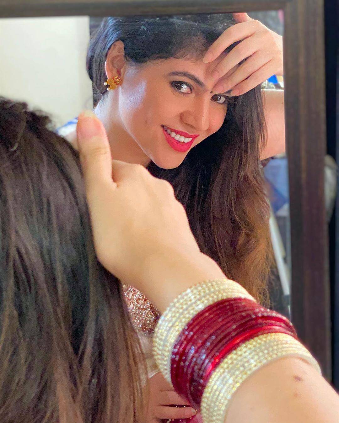 Actress Sherin looks angelic in an embellished white saree