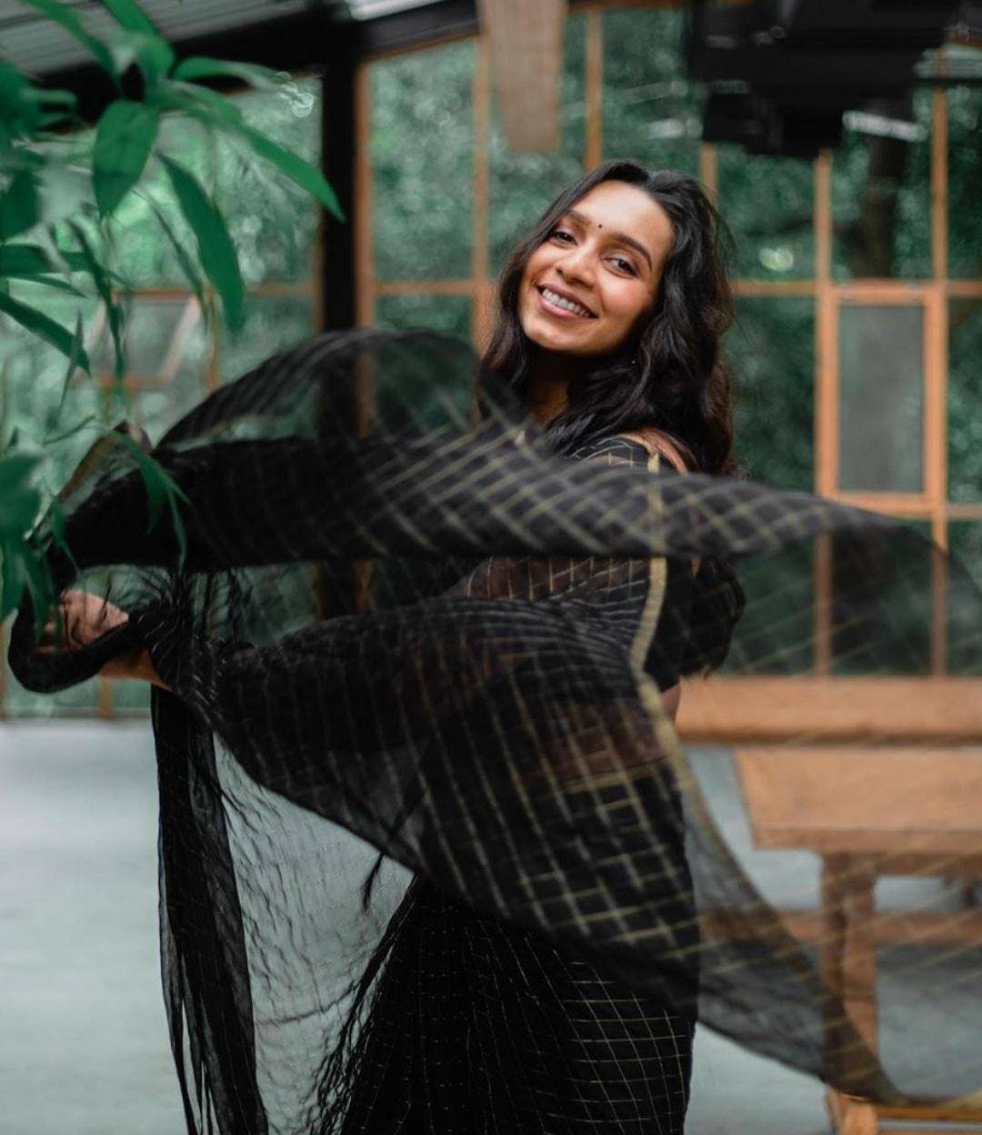 Sanjana Natarajan slays in a slinky black sequinned traditional attire