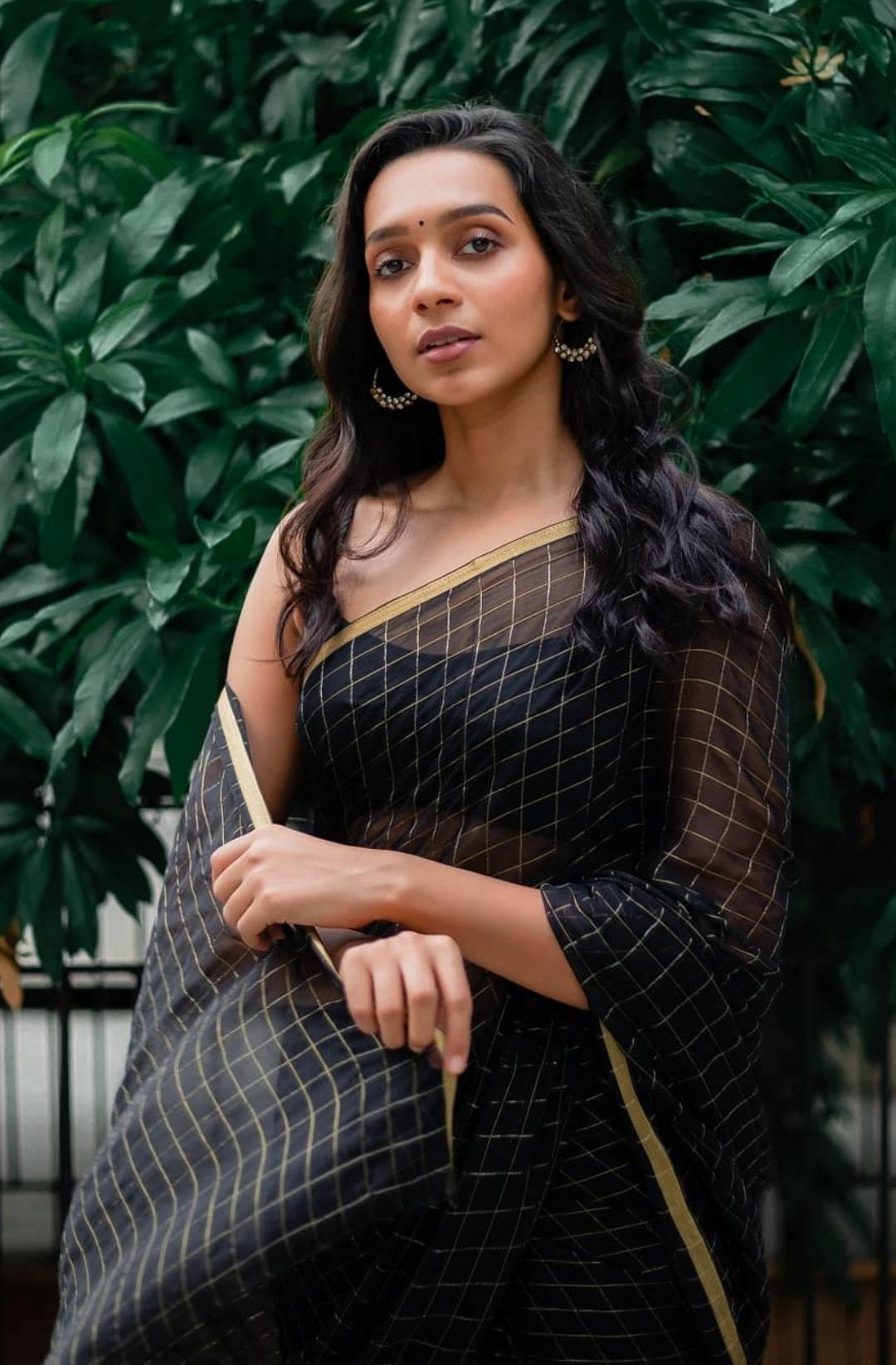 Sanjana Natarajan slays in a slinky black sequinned traditional attire