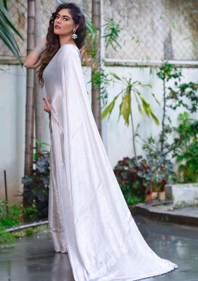 Sherin Shringar looks absolutely beguiling in a white saree