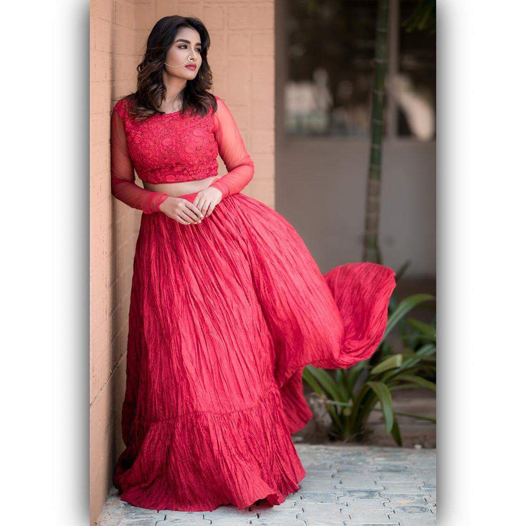 Actress Reshma Riya looks sensuous while she slays in a sheer red gown